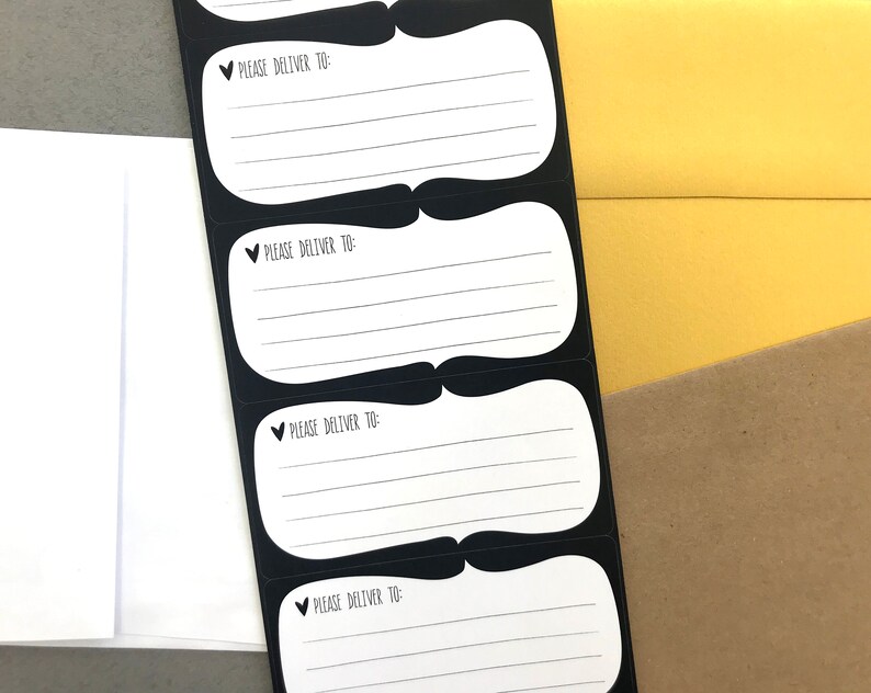 May include: Four black and white delivery address labels with the text "Please Deliver To:" printed on each label.