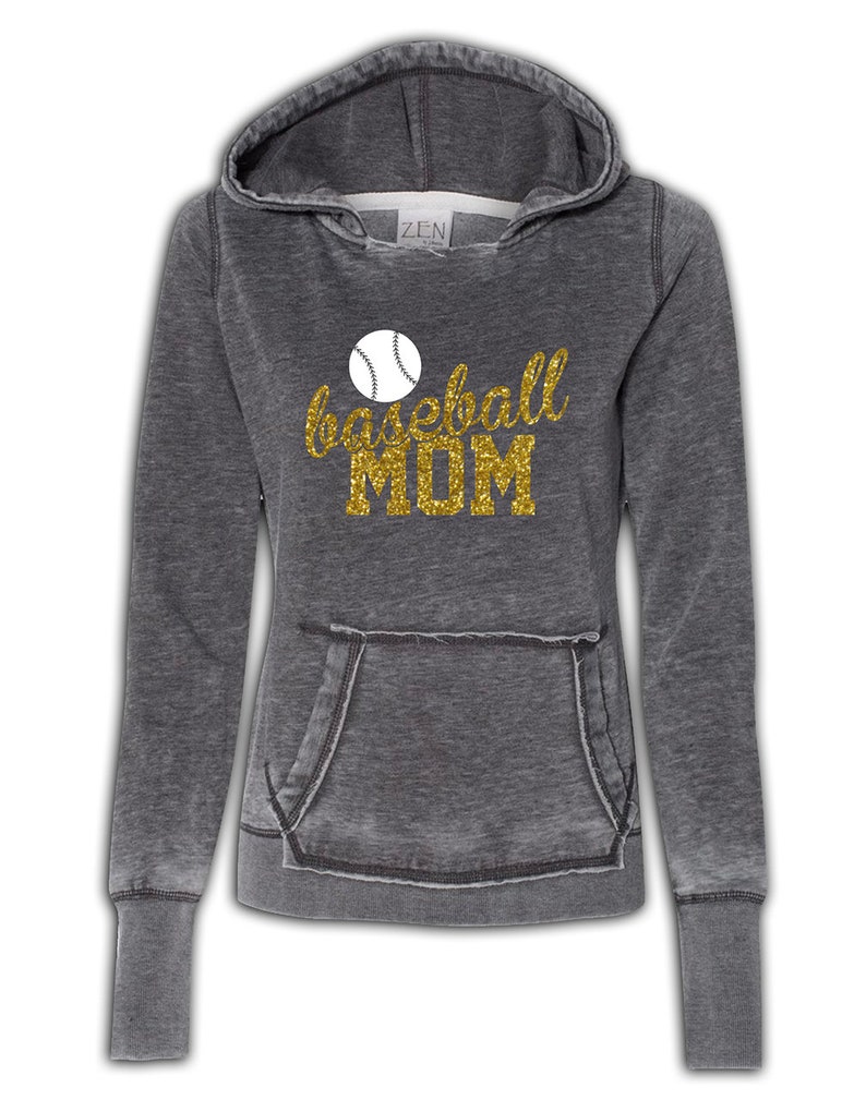 May include: A gray hooded sweatshirt with a distressed look. The front of the sweatshirt has a gold glitter design that says "baseball MOM" with a white baseball graphic.