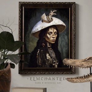 May include: A framed portrait of a person with dark skin wearing a white mushroom hat with a snake on top. The person has white face paint and is wearing a necklace with a skull pendant. The background is a dark green and brown color. The text "ELMCHANTED DARK & MYSTICAL ART" is below the frame.