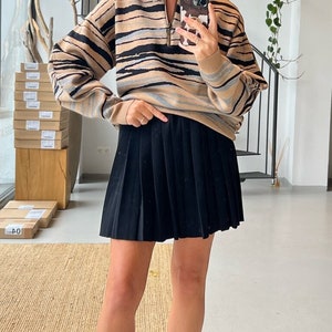 Pleated knitted mini skirt black