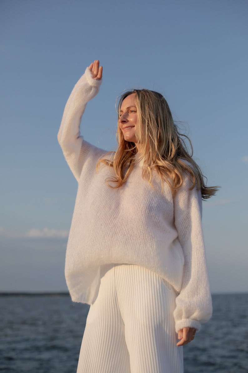 Fluffy, soft, light sweater, feels like a cloud.