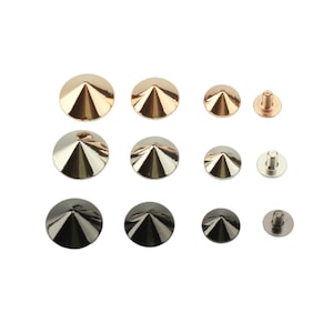May include: A collection of twelve metal cone-shaped studs arranged in three rows by colour, including rose gold, silver, and gunmetal tones. Each stud features a smooth, pointed top and a corresponding threaded screw back for secure attachment.