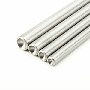 May include: Four cylindrical metal rods arranged in a parallel row. Each rod features a smooth, brushed silver-toned finish and a distinct concave, circular indentation at the visible end, creating a uniform appearance across all pieces.