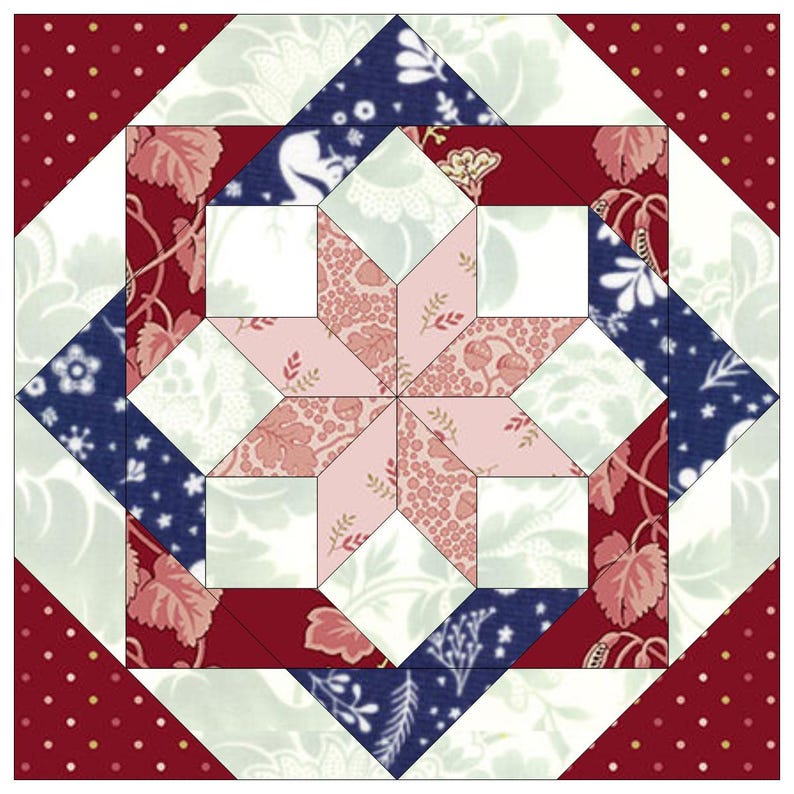 May include: A quilt block with a star design in shades of pink, red, white, and blue. The star is surrounded by a border of red, white, and blue fabric.