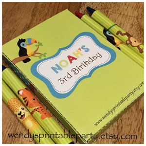 Cute Jungle Animals themed crayon box and matching crayon wrappers PDF templates. Include personalised message on the back. Great for a boy or girl jungle, explorer or craft idea school.  Includes jungle images tiger monkey parrot leopard