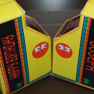 PDF template retro arcade machine shaped gift box.  Personalised with your message. Perfect for a gamer or retro party.