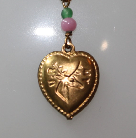 15% Discount applied to price     Puffed Gold Tone Heart Pendant on Sterling 18" C