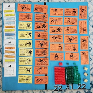 May include: A vintage Monopoly game board with Chance and Community Chest cards, houses, hotels, and dice. The board is blue with a light blue border. The cards are orange, yellow, and red. The houses are red and green. The hotels are red. The dice are white with black dots.