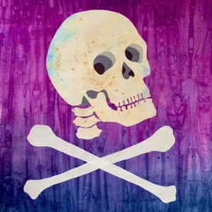 May include: A skull and crossbones design against a vibrant purple and blue tie-dye background. The skull is off-white with gray eye sockets and a detailed jawline. The crossed bones are white, creating a classic pirate flag aesthetic.