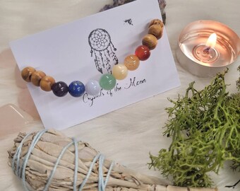 Chakra bracelet with genuine crystals and wooden beads