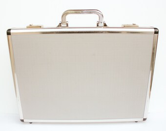 small silver briefcase