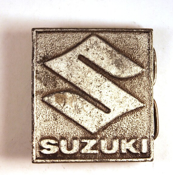 suzuki belt buckle