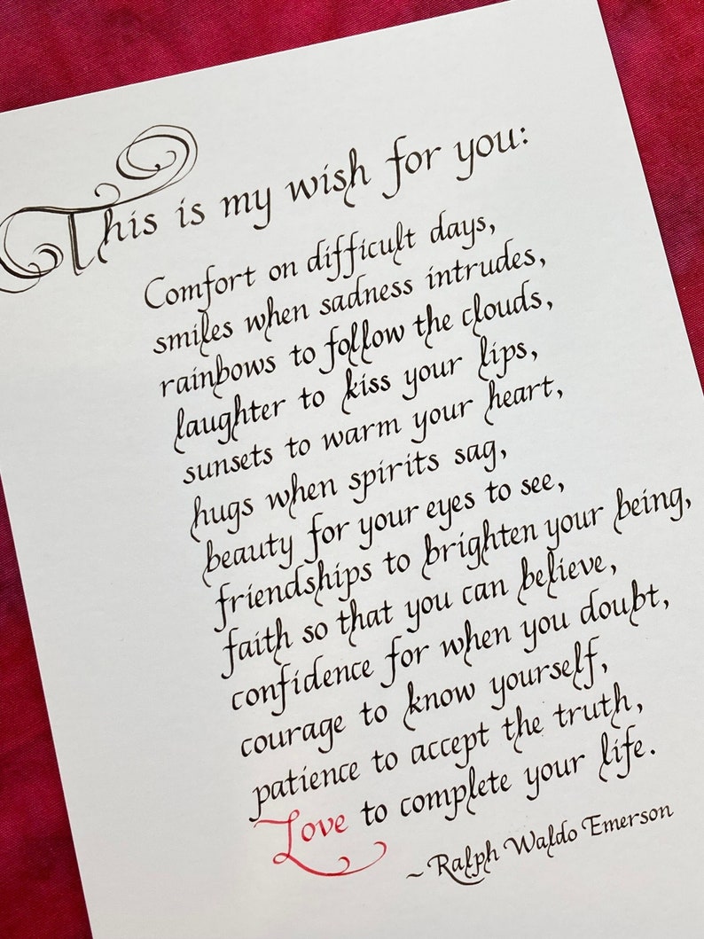May include: A handwritten quote by Ralph Waldo Emerson about life's challenges and the importance of love, faith, and courage. The quote is written in elegant calligraphy on a white background.