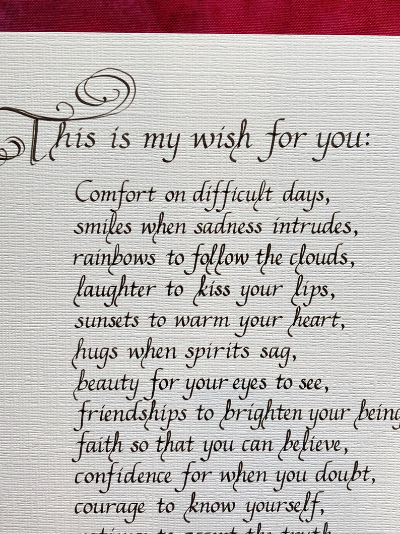 May include: A handwritten note with the text "This is my wish for you: Comfort on difficult days, smiles when sadness intrudes, rainbows to follow the clouds, laughter to kiss your lips, sunsets to warm your heart, hugs when spirits sag, beauty for your eyes to see, friendships to brighten your being, faith so that you can believe, confidence for when you doubt, courage to know yourself, "