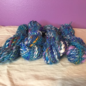 Hand spun thick and thin art yarn, bulky yarn, weaving supplies, appropriately 2 oz, 55 yards,