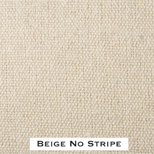 May include: Beige fabric with a woven texture. The fabric has no stripes.