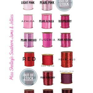 May include: Assortment of pink and red ribbon spools, including light pink, pearl pink, azalea, pearl azalea, raspberry, pearl orchid, fuchsia, pearl fuchsia, red, red twine, pearl red, burgundy twine, claret, wine, and pearl wine. Some colors are out of stock.
