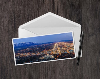 Salt Lake Valley Sunset View 4x9 Note Card - panorama photo greeting card of sunset behind the Wasatch Mountains and downtown Salt Lake City