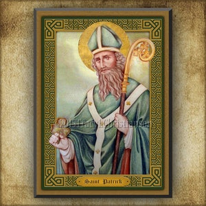 May include: A framed illustration of Saint Patrick, a religious figure, depicted in a green robe with a gold staff and a shamrock. The frame is gold with a Celtic knot design and the text "Saint Patrick" is at the bottom.