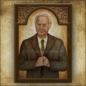 May include: A framed portrait of a man with a mustache and a white shirt with a green tie. He is wearing a brown suit jacket and holding a rosary in his hands. The frame is brown with ornate carvings.