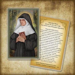 May include: A religious card featuring a portrait of Adele Brise, a seer, holding a book and rosary. She is dressed in a black habit with a white wimple. A second card with text about Adele Brise is visible.
