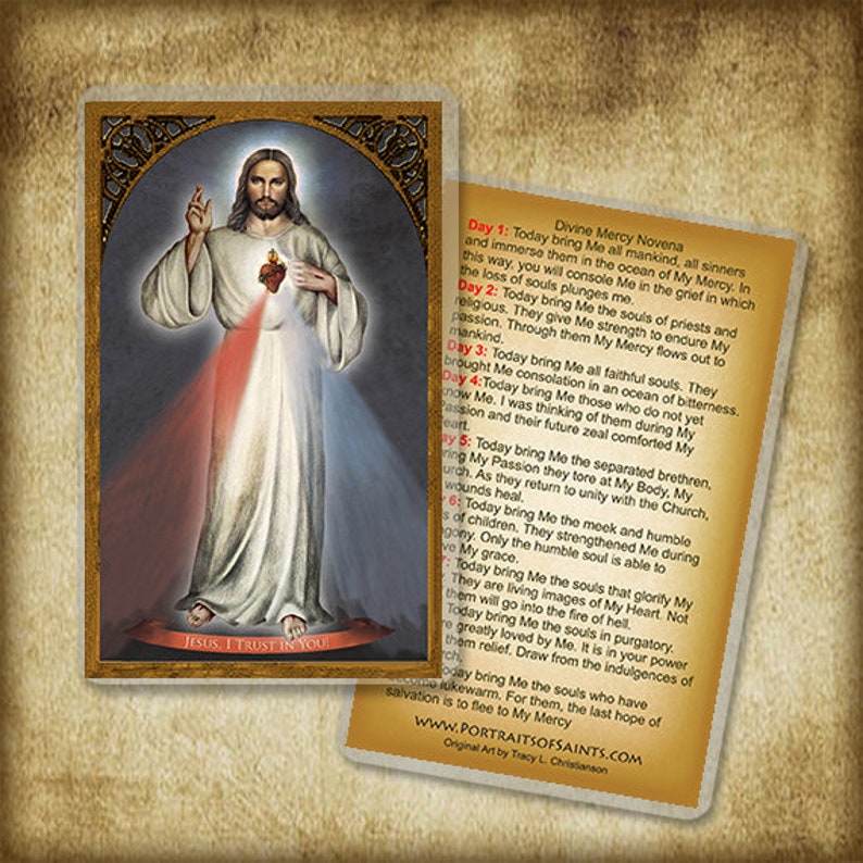 May include: A religious card with a painting of Jesus Christ with a red and white heart radiating light. The text on the card reads "Divine Mercy Novena" and includes a nine-day prayer to Jesus.