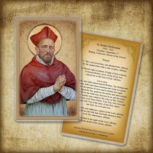 May include: A holy card featuring a portrait of Saint Robert Bellarmine, a Catholic bishop and doctor of the Church. The card includes a prayer to Saint Robert Bellarmine, asking for his intercession. The card is printed on a cream-colored background with a gold border.