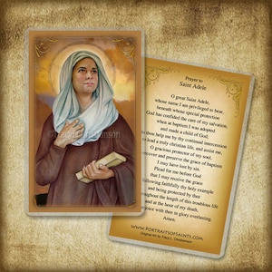 May include: A prayer card featuring a painting of Saint Adele holding a book. The card has a prayer to Saint Adele printed on it. The prayer asks for her intercession and protection. The card is a religious item for Catholics.