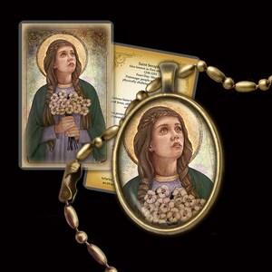 May include: A gold-toned pendant necklace with a round glass charm featuring a painting of Saint Seraphim. The charm has a gold-toned frame and a gold-toned chain. The painting depicts a young woman with long brown hair, wearing a green dress and holding a bouquet of white flowers. The background of the painting is a golden halo.