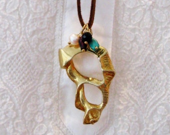 Gold plated Shell pendant with gemstones