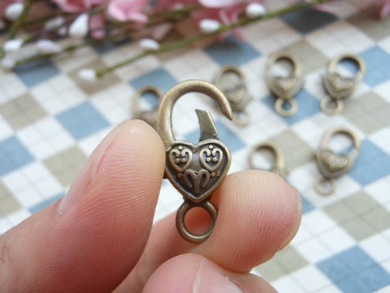 50 pcs / Bronze Color Lobster Clasp avec coeur coeur coeur (12 x 27 mm) coeur fermoir clasp.creative. Porte-clef clé Charms porte-clés porte-clés 945049 50 pcs / Bronze Color Lobster Clasp avec coeur coeur coeur (12 x 27 mm) coeur fermoir clasp.creative. Porte-clef clé Charms porte-clés porte-clés 945049