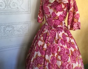 1950s party dress with a violet and gold rose print.  50s taffeta dress with a full skirt.