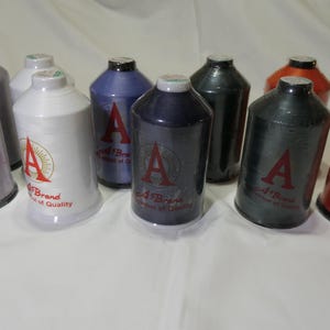 May include: A rustic wooden sign with the text "Welcome to our home" in white lettering. The sign features a distressed finish and a simple, inviting design, perfect for entryway decor.