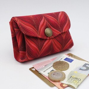 Porte-monnaie compact à 3 compartiments pour cartes bancaires et espèces, nuances rouges et orange avec une touche dorée