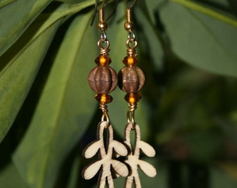 Pendientes de cobre y madera ciclo