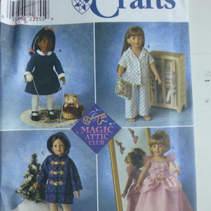 May include: Simplicity Crafts pattern 8460 features doll clothing designs. The pattern includes four doll outfits: a navy dress, pajamas, a blue coat, and a pink gown. The pattern is labeled "Magic Attic Club".