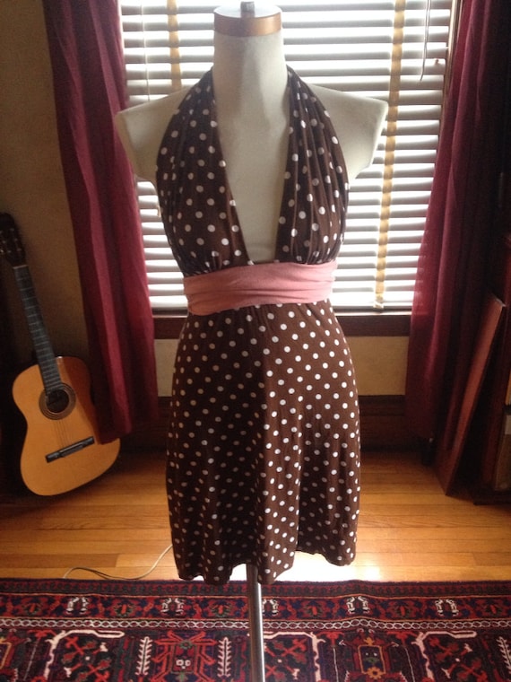 80s does 50s polka dot halter dress.