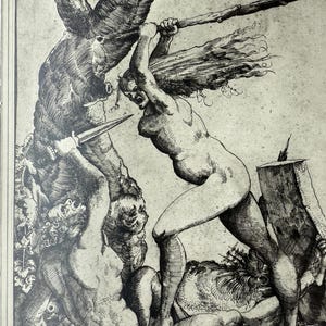 May include: A monochrome etching presents a dynamic scene of figures in conflict. A nude person brandishes a weapon, amidst other struggling figures. The artwork is detailed, with visible textures and shading, and is framed.