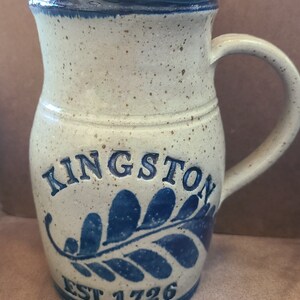 May include: A blue and white ceramic pitcher with a blue leaf design and the text "KINGSTON EST 1726".