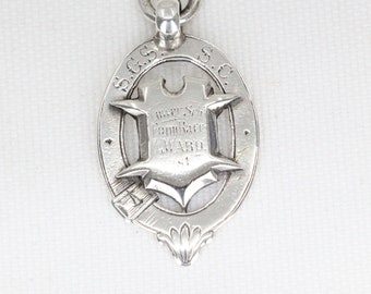 Ancien pendentif médaille d'argent des Grammer Schools de Sydney en argent sterling - W.Kerr Sydney - Vers : 1900