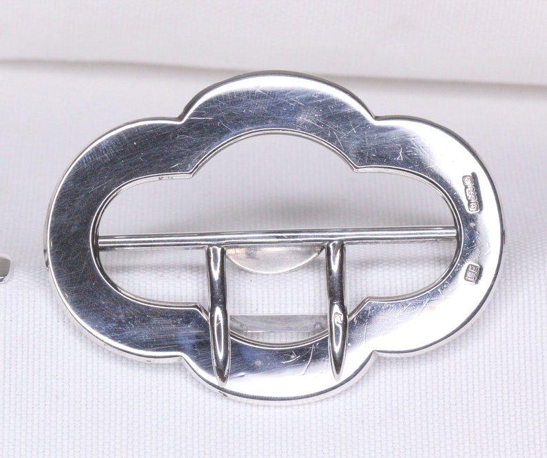 real silver belt buckle