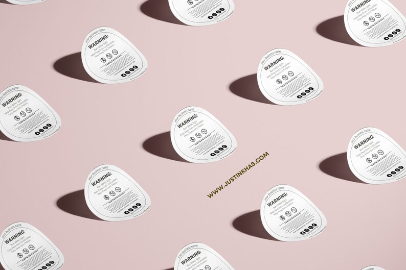 May include: Multiple white round warning labels with black text and symbols. The text reads "WARNING:  This product contains ..." and includes a list of warnings. The labels are arranged in a grid pattern on a light pink background.