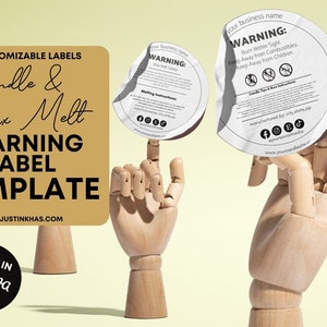 May include: A set of four customizable candle and wax melt warning labels. The labels are white with black text and icons. The text on the labels reads "WARNING: Burn Within Sight. Keep Away from Combustibles. Keep Away from Children." The labels are displayed on a wooden hand model.