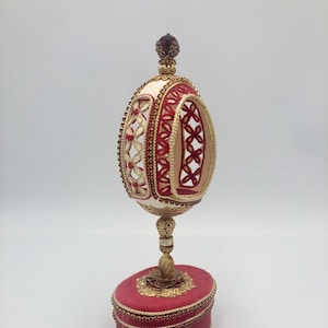 Vintage Handmade Carved Egg Music Box Red and Gold Bejeweled Plays Somewhere My Love Doctor Zhivago Created by Hazel DeVorss 1990
