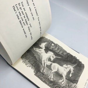 May include: A black and white illustration of two unicorns running through a field under a full moon. The text reads: "You are a beauty! You have special gifts. Enjoy who you are. You are uniquely - you! So go and be happy. Enjoy life today. Love who you are! That's what Melvin would say."