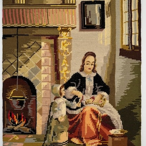 Bordado vintage terminado y petit point: escena renacentista de una mujer pelando manzanas de Pieter de Hooch. Sin marco. 50 x 40 cm.