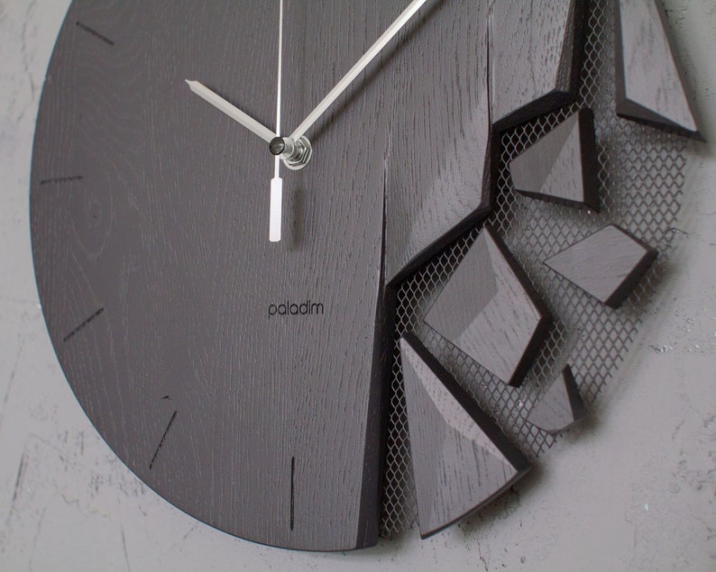 shattered wall clock by paladim studio