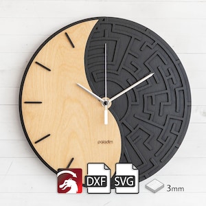 May include: A round wall clock with a yin-yang design. One half is natural wood, the other is black with a maze pattern. The clock hands are silver. The word "paladim" is printed on the clock face. The clock is 3mm thick.