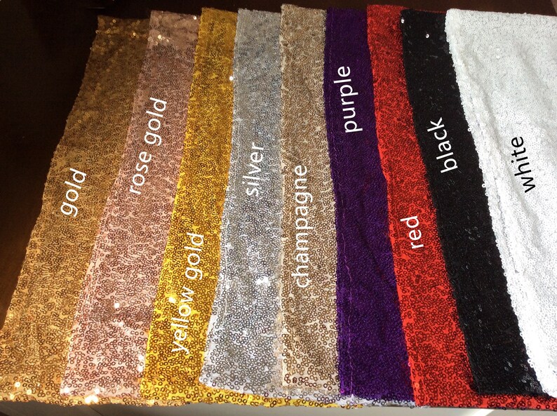 May include: A selection of sequin table runners in various colors, including gold, rose gold, yellow gold, silver, champagne, purple, red, black, and white.