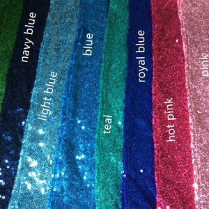 May include: A close-up of eight fabric swatches with sequins in different colors. The colors are green, navy blue, light blue, blue, teal, royal blue, hot pink, and pink.